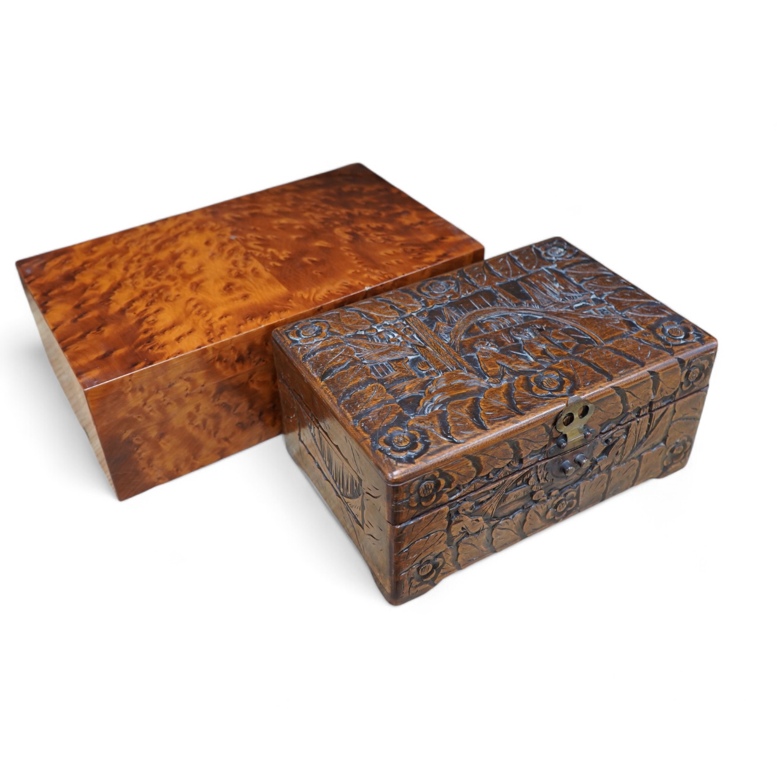 A burr walnut humidor and an Indonesian, possibly Javan, carved wood box, largest 39cm wide. Condition - fair to good